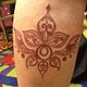 Dark Brown Ink Tattoo
