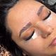 Brow lamination + tinting.