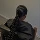 2 braids in ponytails