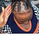 Updo cornrow with bun
