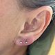 Lobe piercing w/ titanium design