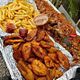 Catfish BBQ and plantain /potato /bole.