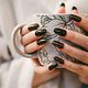 Acrylic or Hybrid gel with tips and any nail art