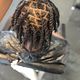 Loc retwist + style
