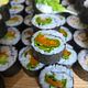 Wortel in soja, gember en suiker met rucola